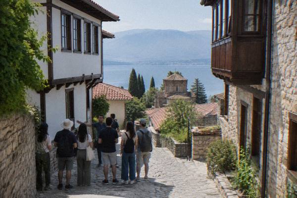 Small group walking through the Old Town lanes with a guide