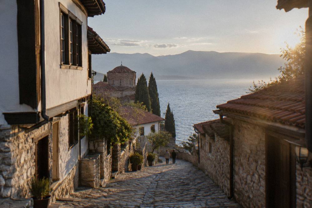 A calm evening over Lake Ohrid seen from the shoreline near the old town