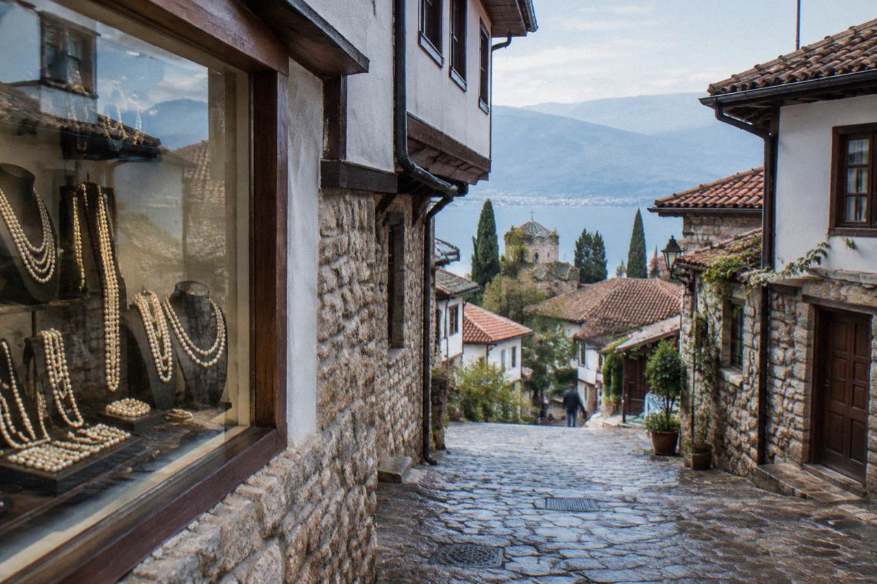 A jewellery shop window in Ohrid old town displaying strands of pale pearls