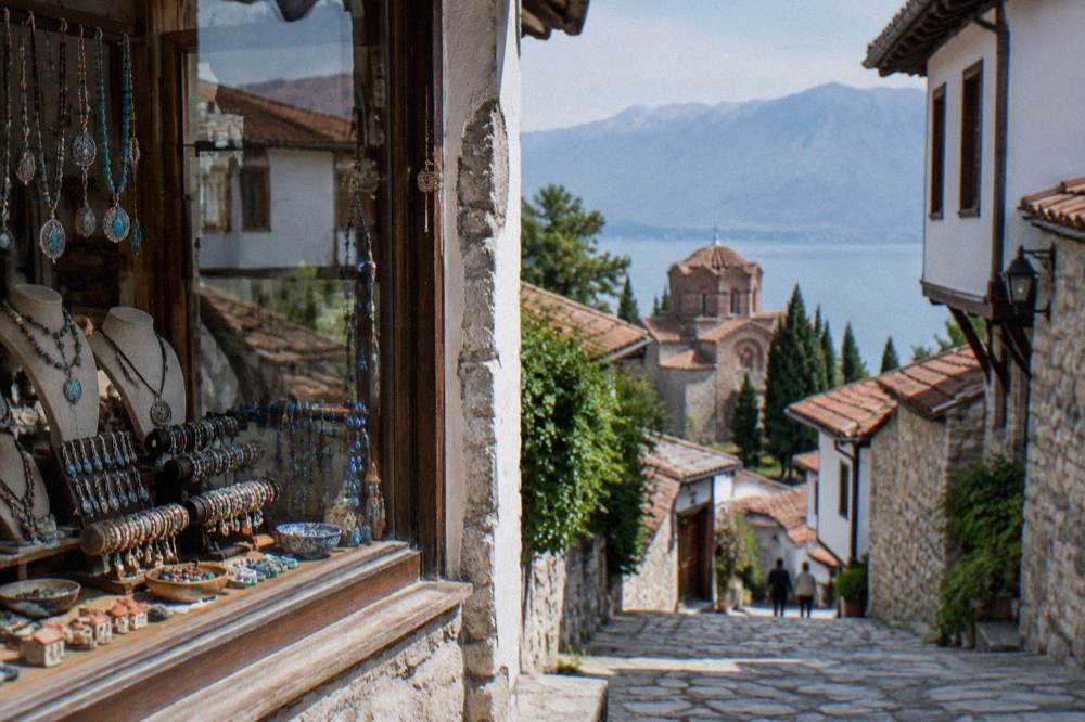 A crafts shop window displaying handmade jewellery and souvenirs in Ohrid