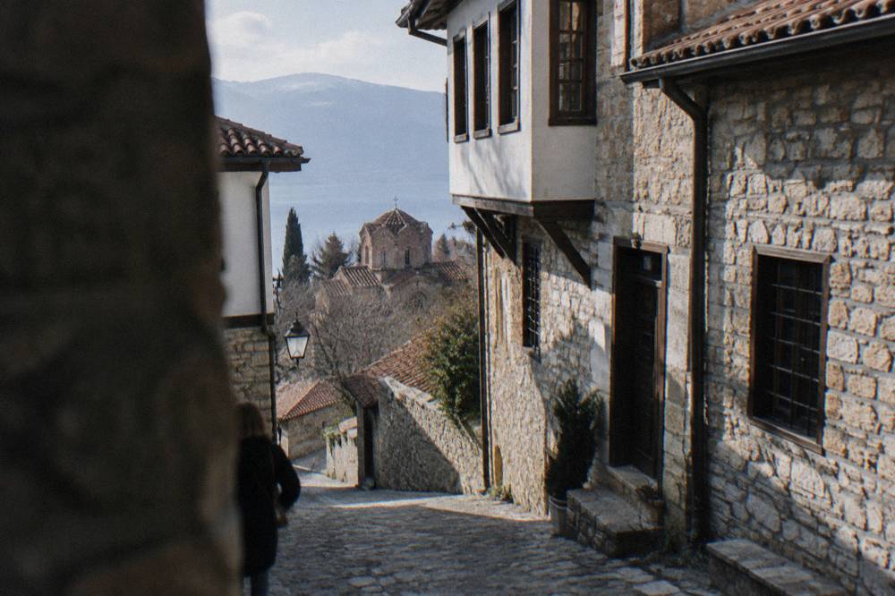 The stone facade of a museum house on a narrow Ohrid street