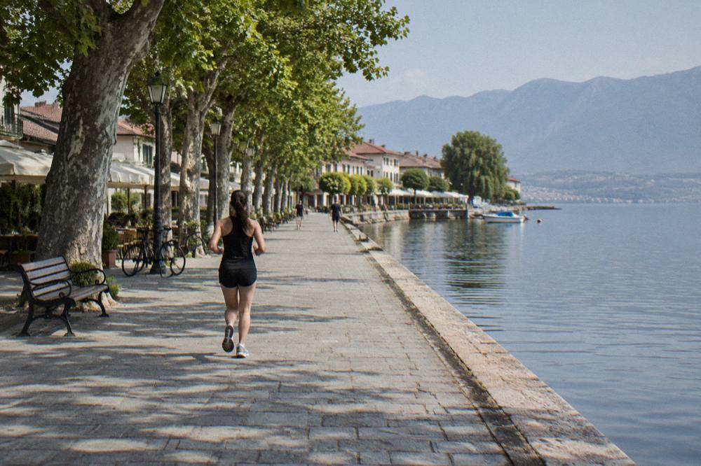 Struga's town centre beside the water with parked bicycles and low buildings