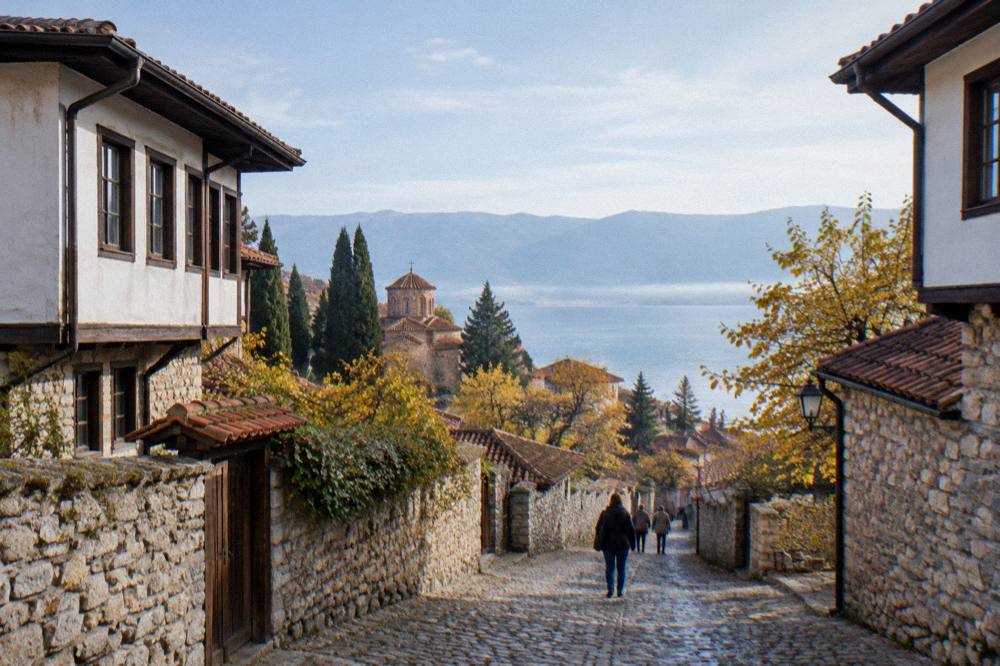 Autumn light over the tiled roofs of Ohrid old town and the lake beyond