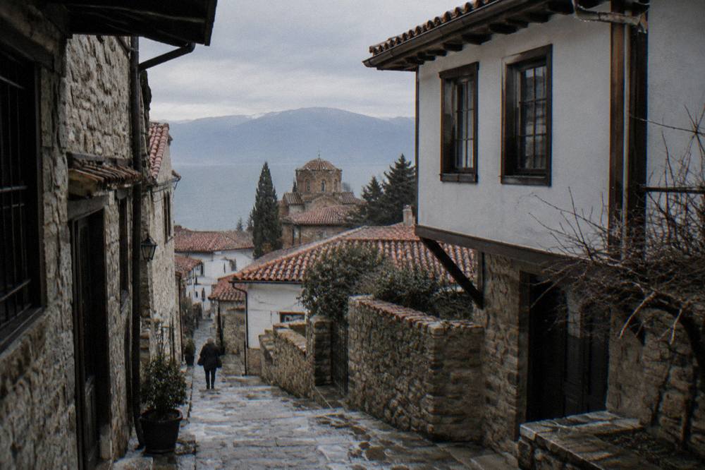 A pedestrian stone stairway in Ohrid lined with old houses