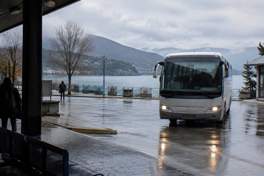 Intercity bus arriving at Ohrid bus station near the lake shore