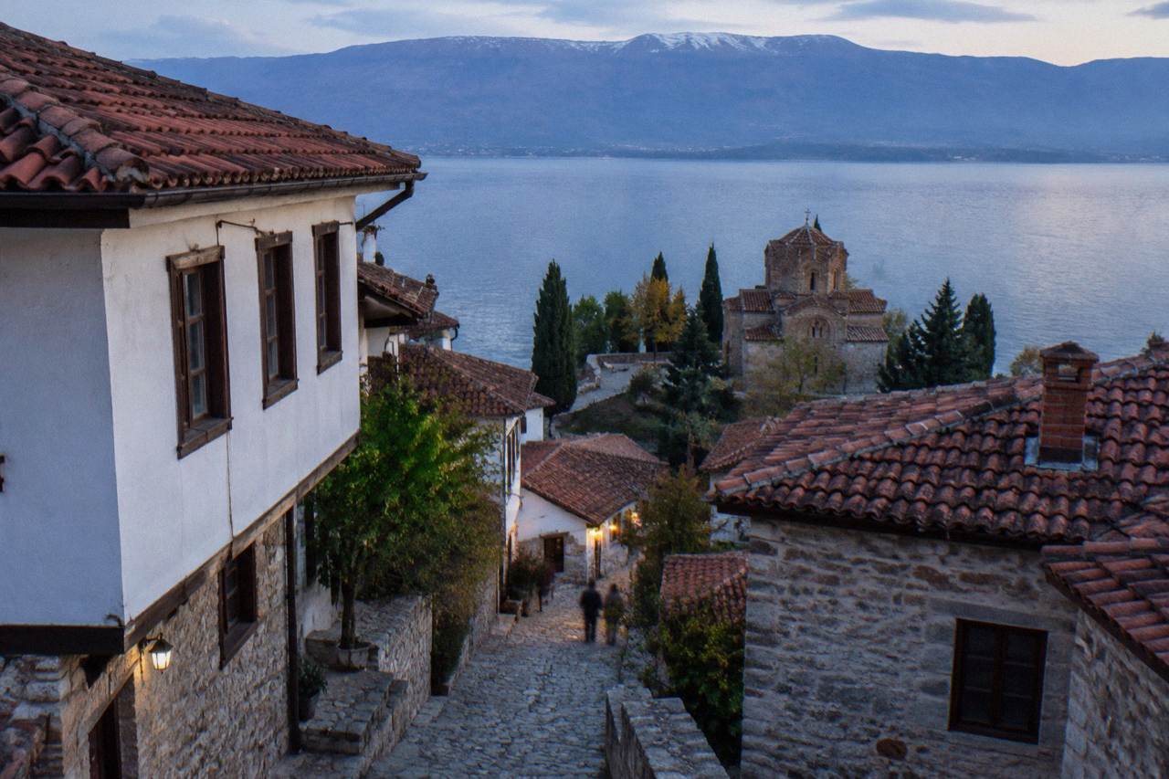 The old town of Ohrid seen from the lake with Church of St John at Kaneo on the cliff above the water