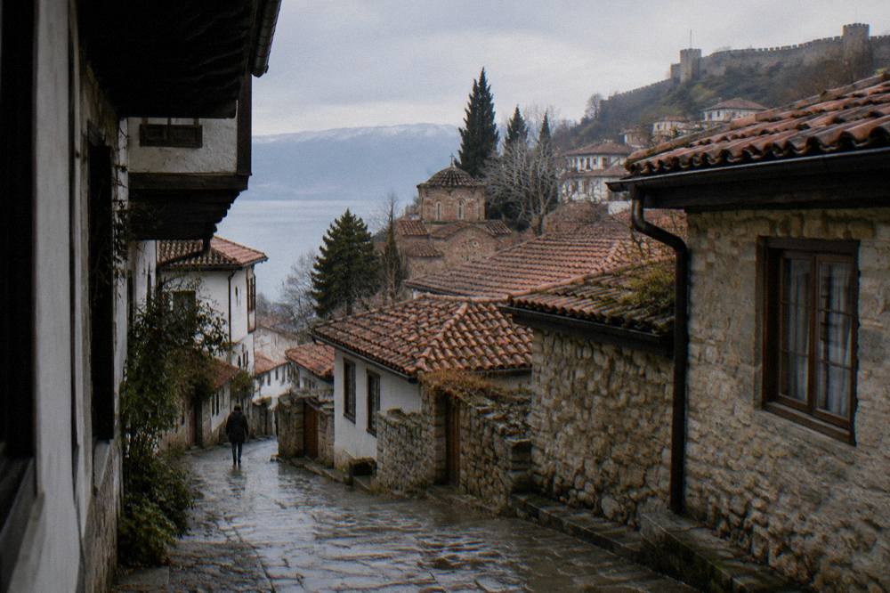 Tile roofs of Ohrid old town rising up the hillside toward the walls of Samuel's Fortress