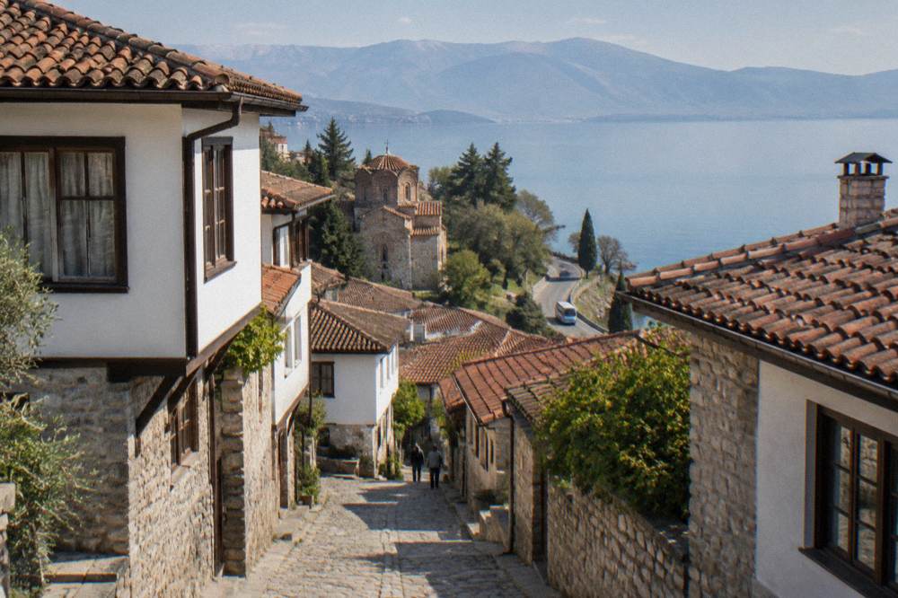 A small local bus on the road along the eastern shore of Lake Ohrid