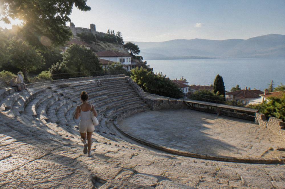 The stone seating rows of the Ancient Theatre of Ohrid under an open sky