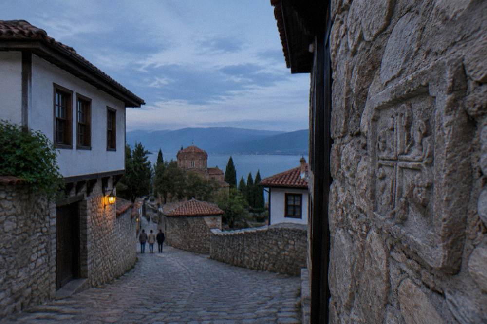 A close view of Cyrillic lettering carved on a stone plaque in Ohrid