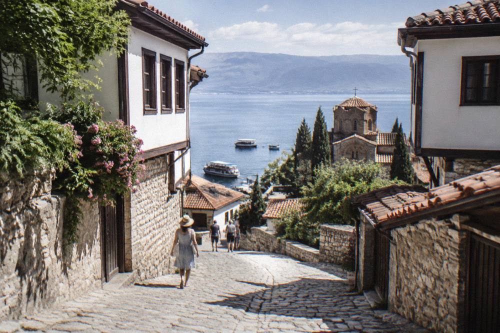 Tour boats moored at Ohrid harbour on a calm summer morning