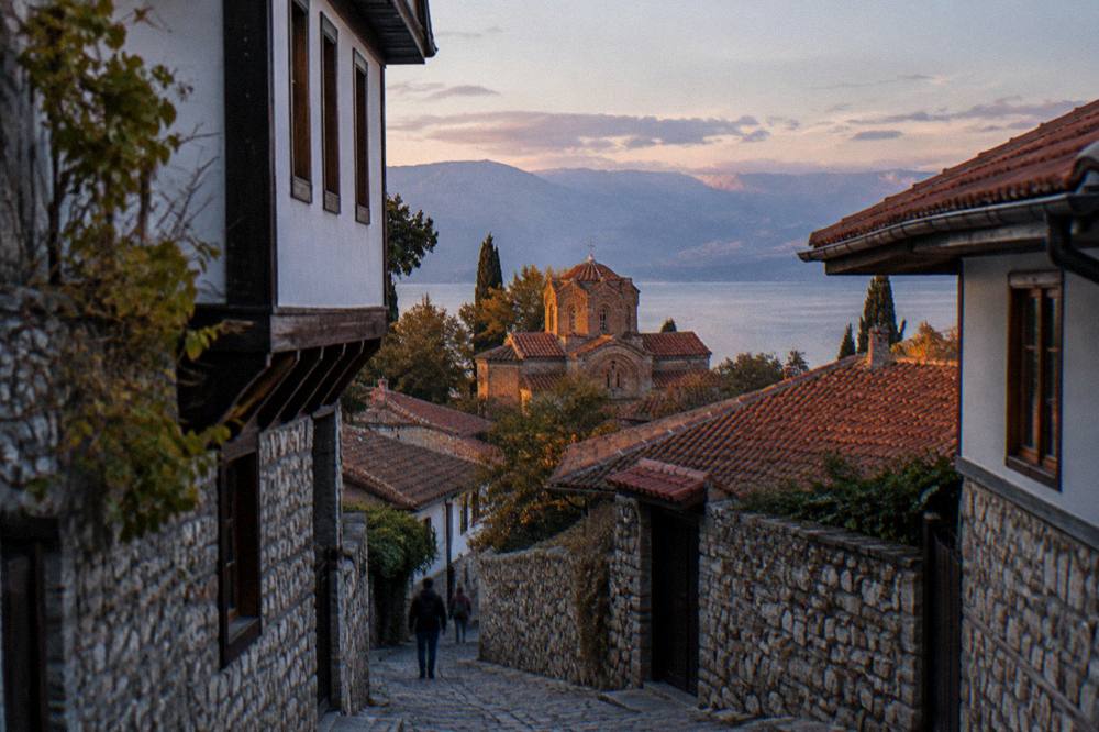 Warm evening light on the rooftops and church domes of Ohrid old town