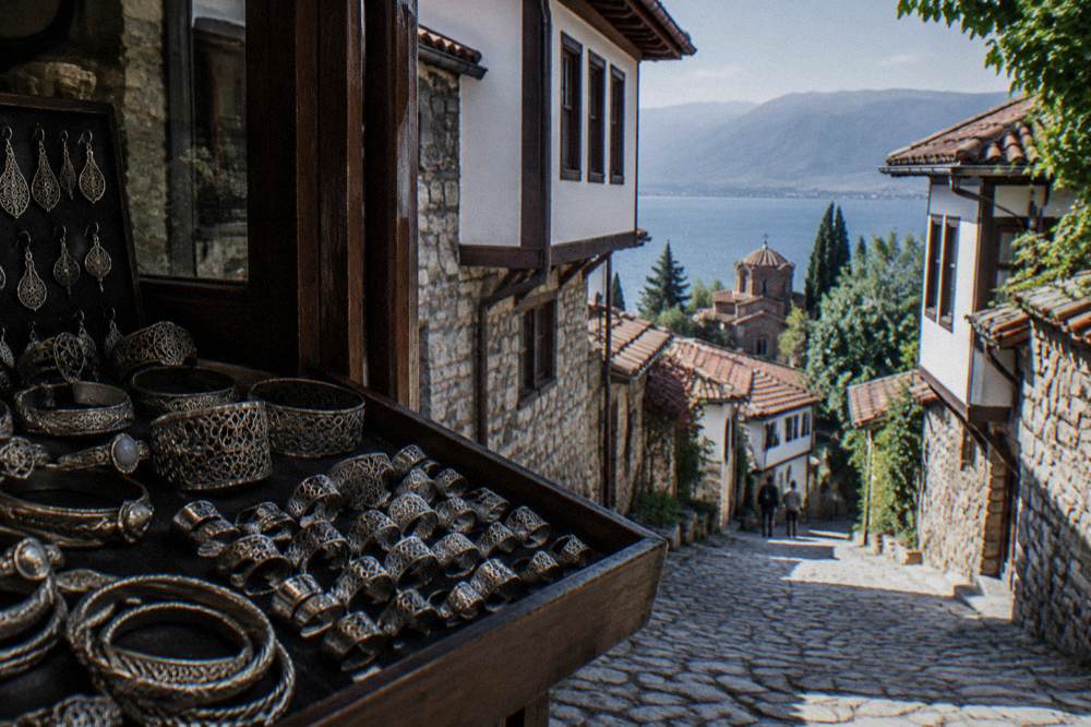 Filigree silver rings and bracelets arranged on a jeweller's tray in an Ohrid shop