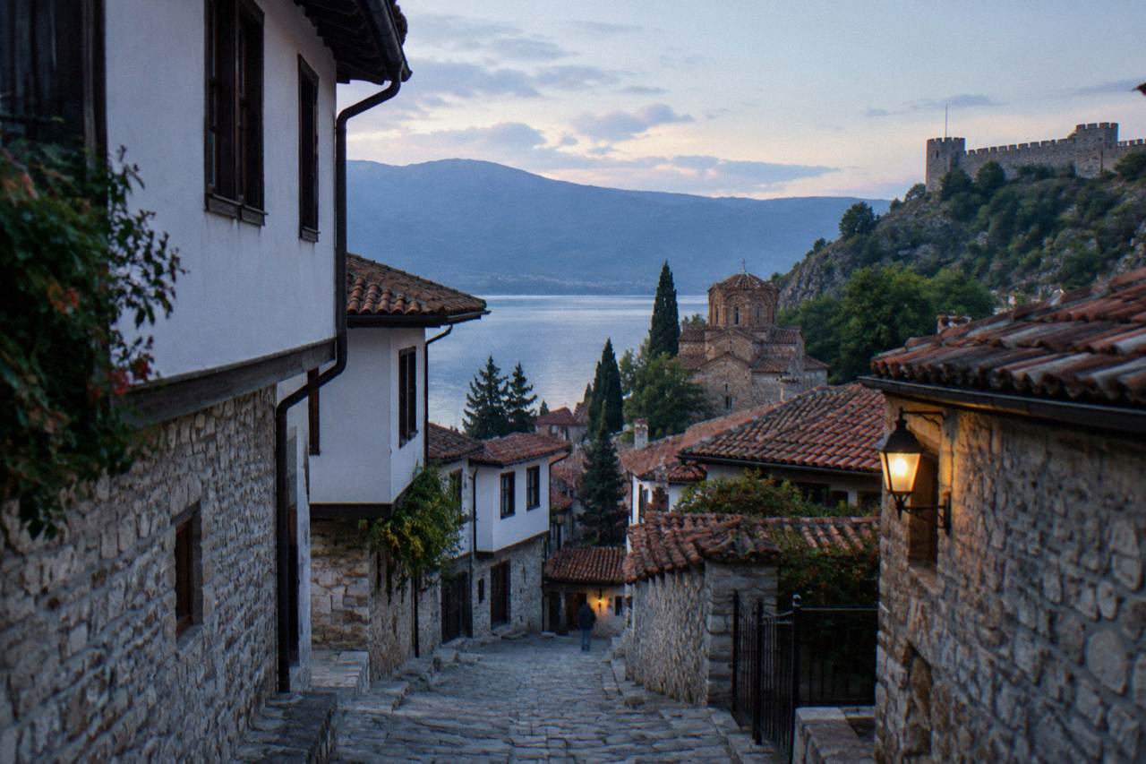 The old town of Ohrid seen from the lake with the stone walls of Samuel's Fortress on the hill above