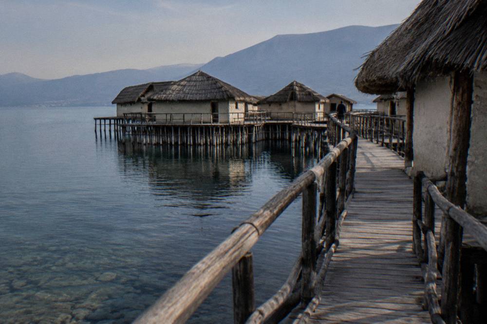 Wooden walkway of the Bay of Bones museum on stilts above Lake Ohrid