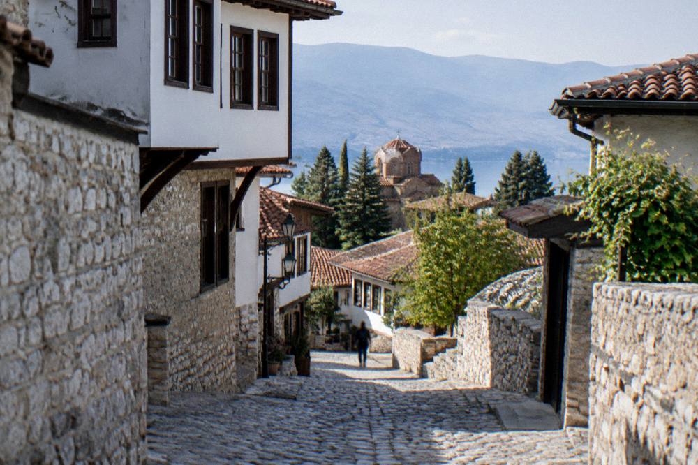 Cobbled stone lane in the old town of Ohrid with traditional houses