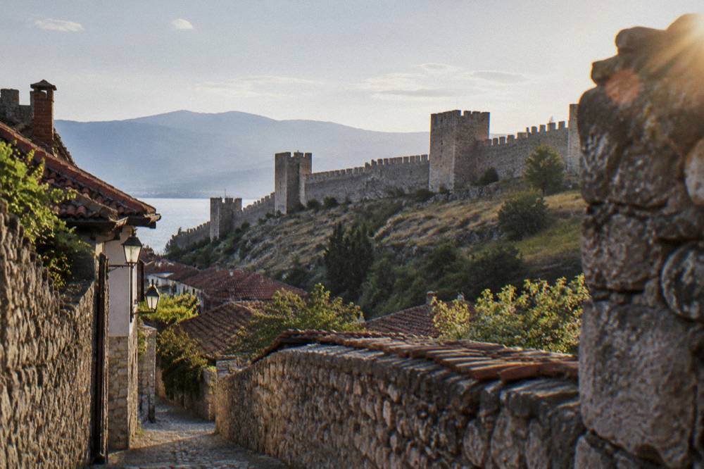 Stone walls of Samuel's Fortress seen from a lane in Ohrid old town