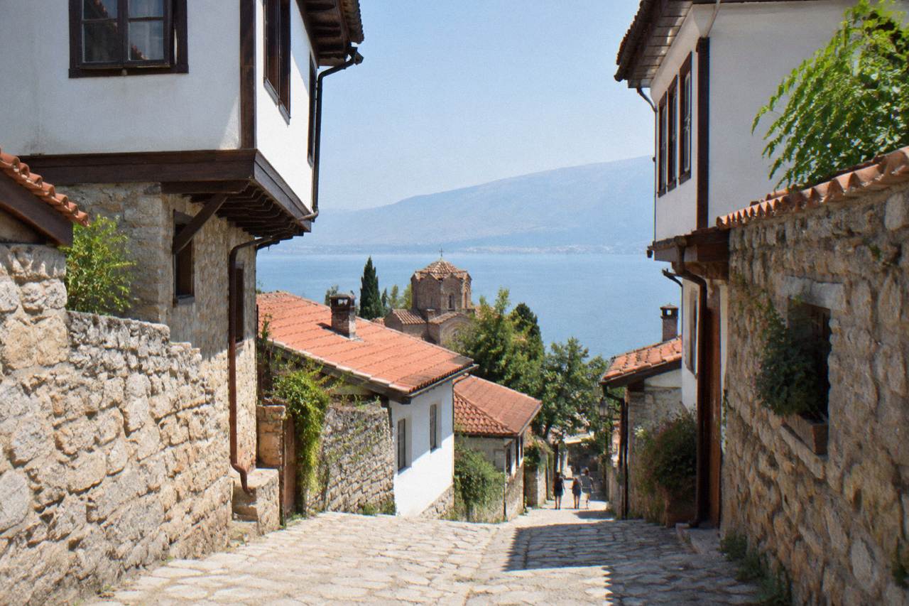 The old town of Ohrid rising above the blue water of Lake Ohrid