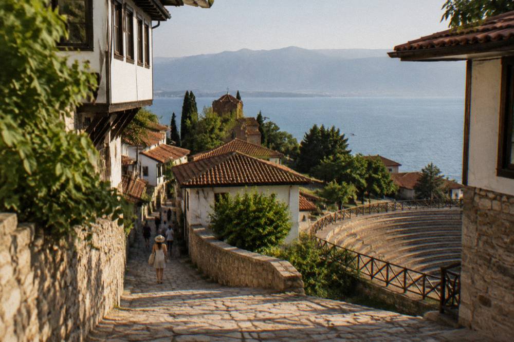 Rows of stone seats of an ancient open-air theatre above the Ohrid old town